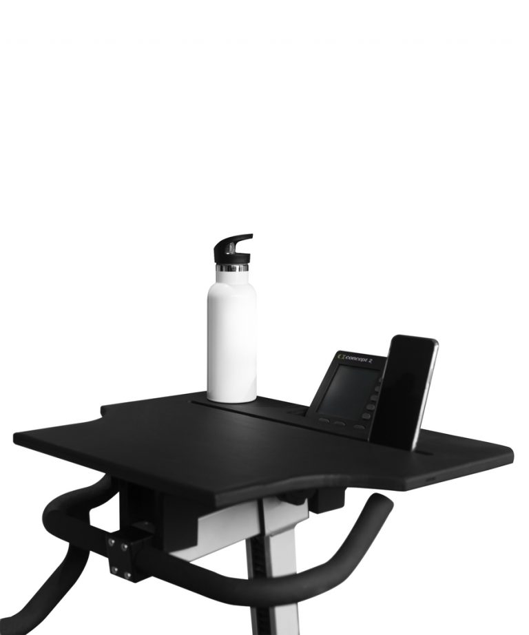 black bikerg table with phone and white water bottle