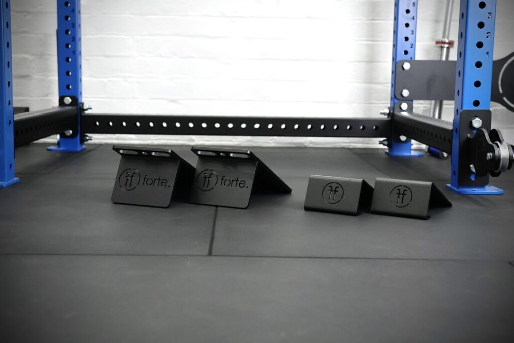 set of slant blocks and slant doubles positioned in the middle of a squat rack