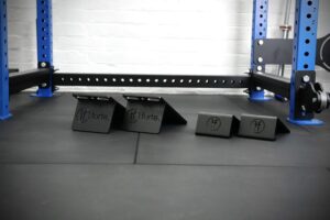 set of slant blocks and slant doubles positioned in the middle of a squat rack