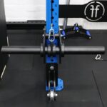 rack roller mounted on a blue squat rack